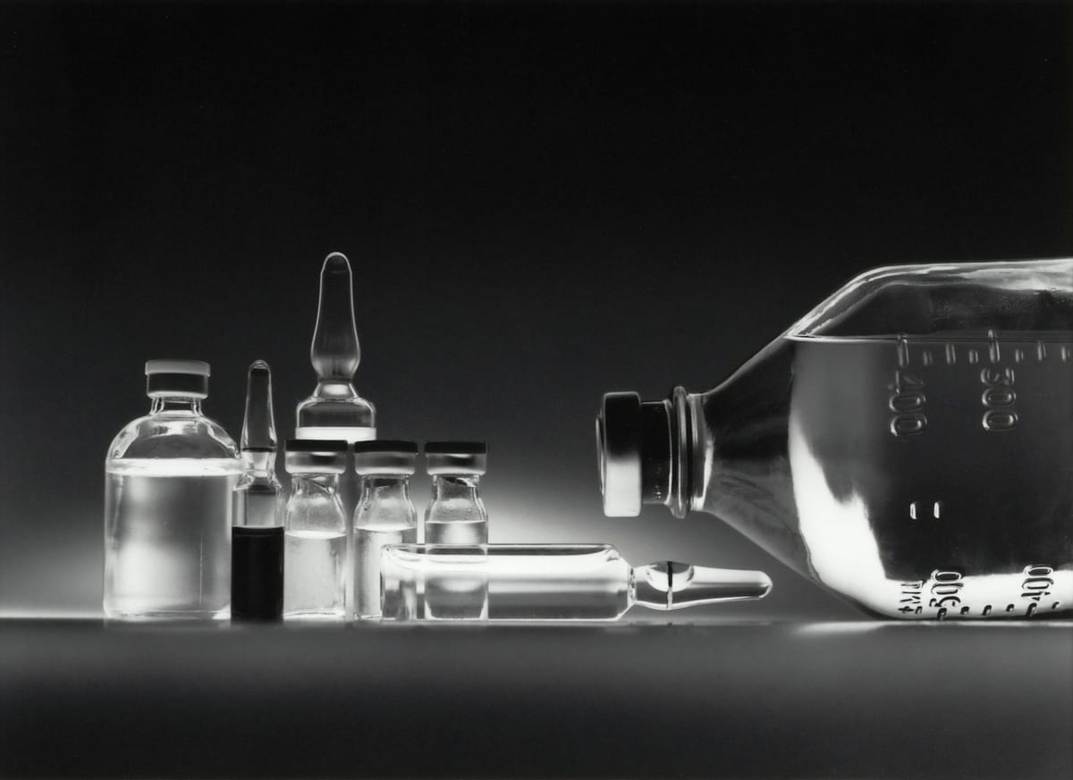 Glass vials of vitamins prepared for an infusion